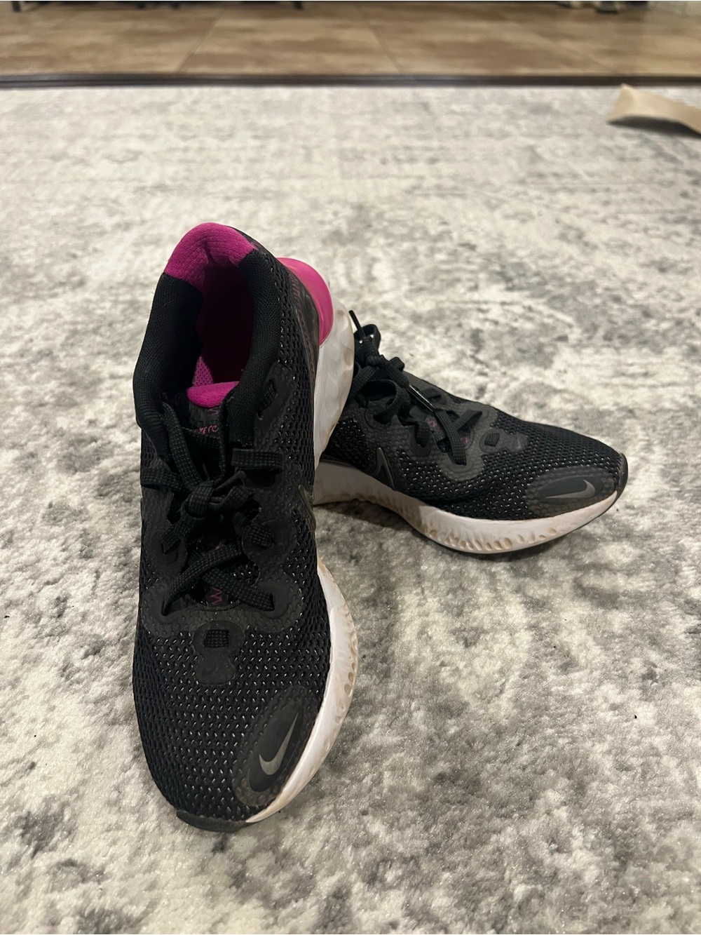 Nike Women's Black Running Shoes with Pink Heel and Collar